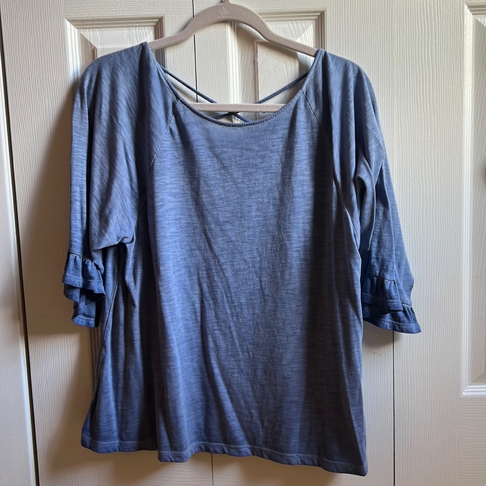 Ana blue blouse. Size L. Frilly sleeves, criss cross back
